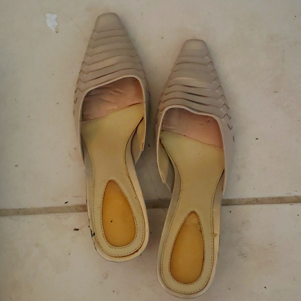 Slightly worn beige slides